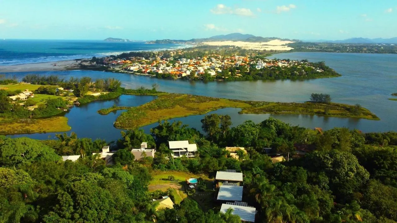 Chalés e Bangalôs Ibiraquera Praia do Rosa Сasa de vacaciones